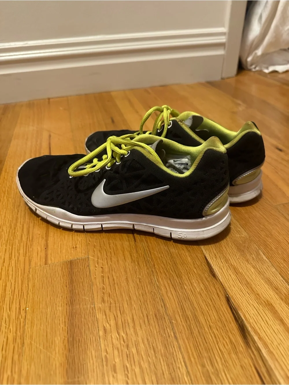 Nike Black Sneakers with Neon Yellow Accents